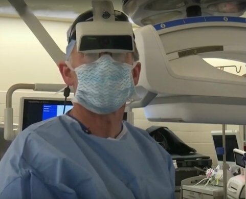 Spine Surgeon Mark Weight with augumented reality equipment.